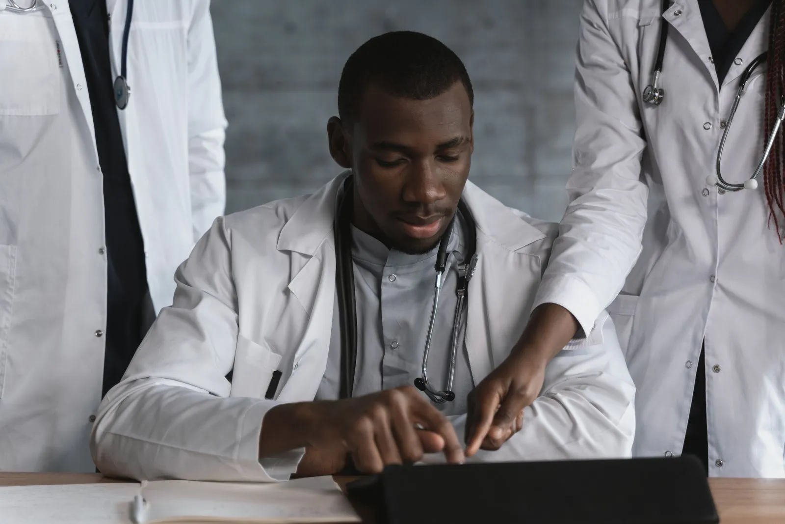 A diverse healthcare team collaborating on a clinical research program