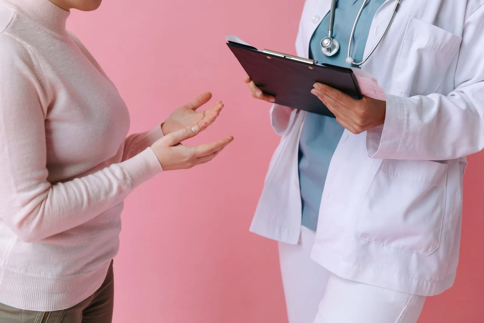 A patient receiving a clear, supportive explanation from a clinician