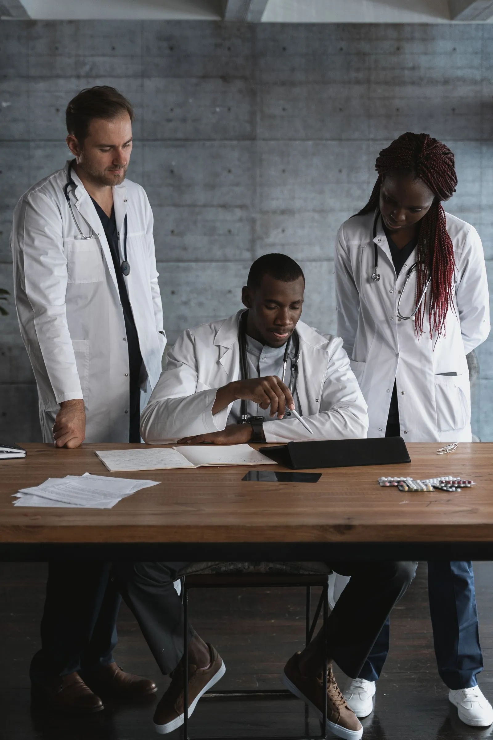 Healthcare professionals collaborating on a clinical research program